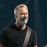 James Hetfield of Metallica smiling on stage during the M72 World Tour